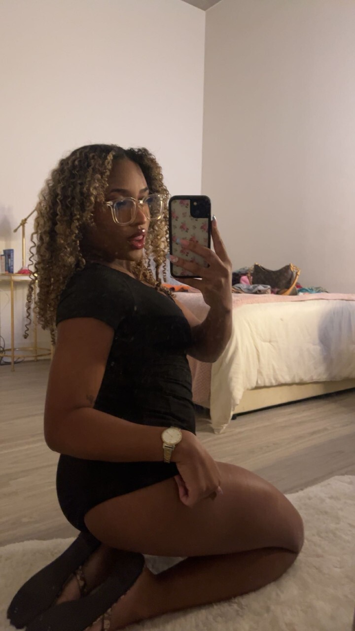 Curly haired ebony hottie Sky Alexxxis teases with her big ass andamp; natural tits