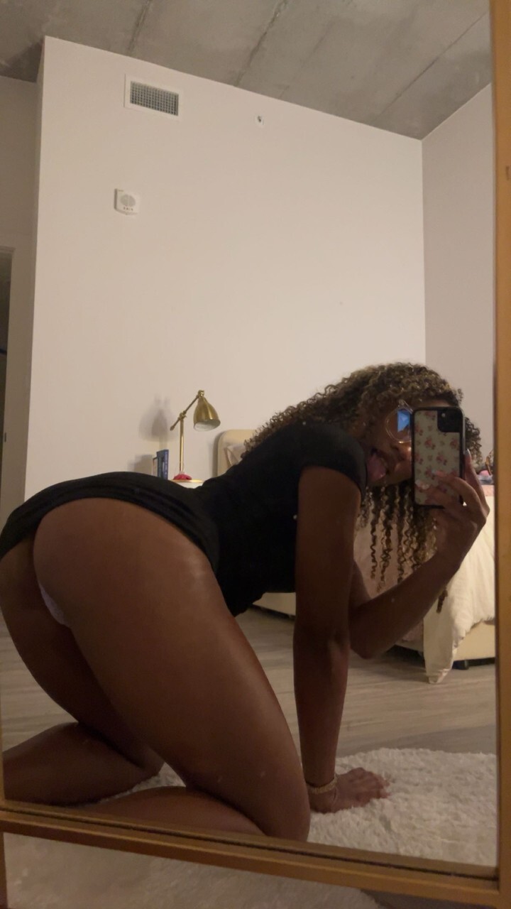 Curly haired ebony hottie Sky Alexxxis teases with her big ass andamp; natural tits