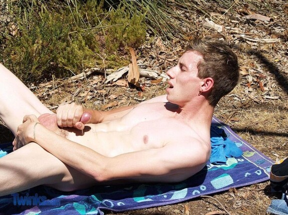 Sexy skinny twink Rick D flaunts his rock hard dick and hairy asshole outdoors