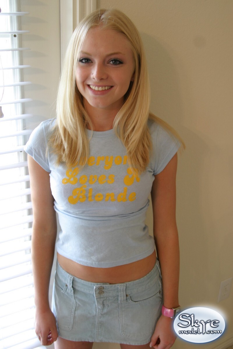 Blonde newbie Skye Model fashions through herself in a quick skirt