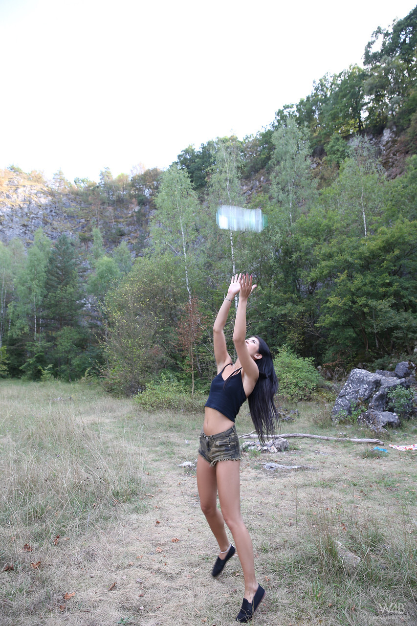 Skinny Czech youngsterager Lady Dee pissing and posing butt bare in lovely nature