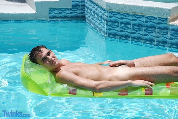 Kinky gay twink Jordan Jax loses his panties and poses naked in the pool