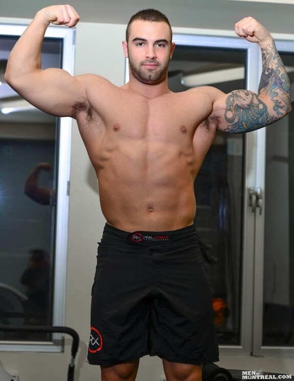 Bodybuilder Calvin Pierce indicates off his massive muscles & his erect dick