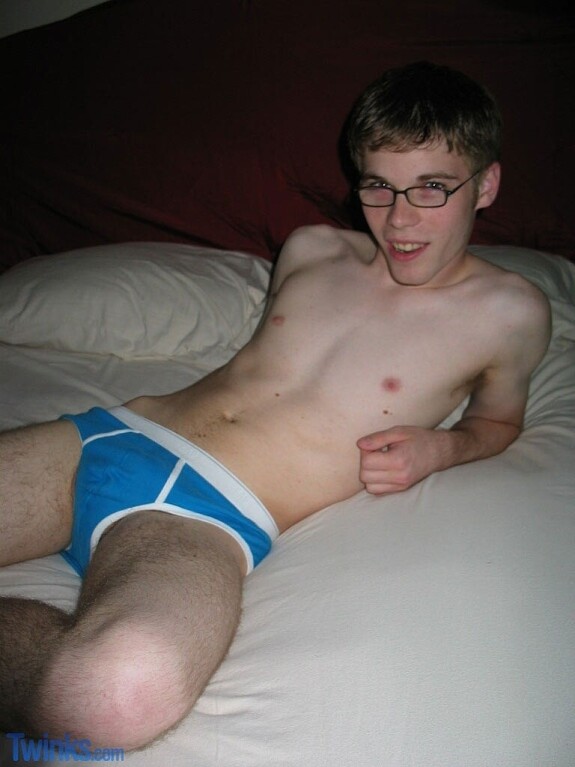 Nerdy twink in glasses Billy Gee shows his slim figure and jerks off his dick