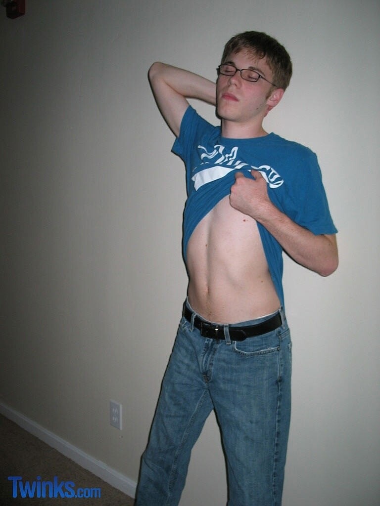 Nerdy twink Billy Gee loses his blouse and denims and jerks off his large dick