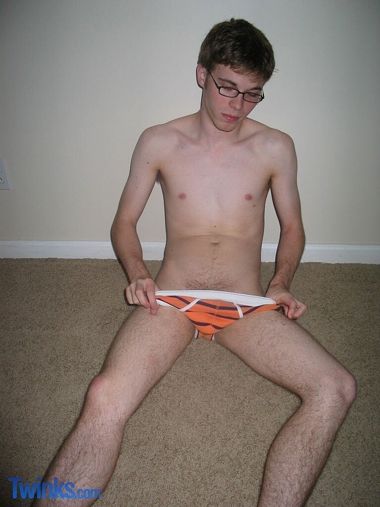 Nerdy twink Billy Gee loses his blouse and denims and jerks off his huge dick