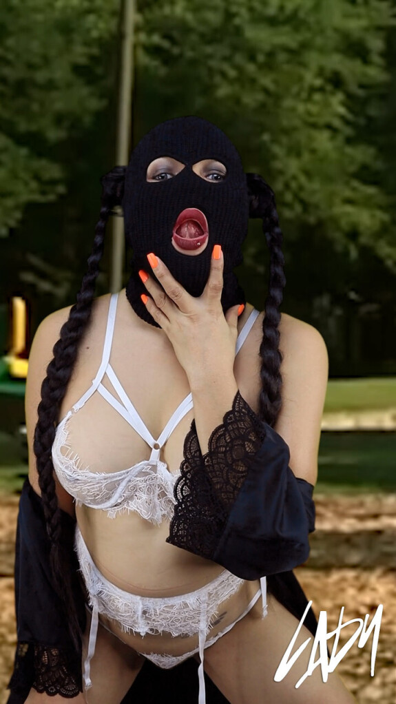 Masked brunette shemale flaunting her big ass & tits in her lingerie outside