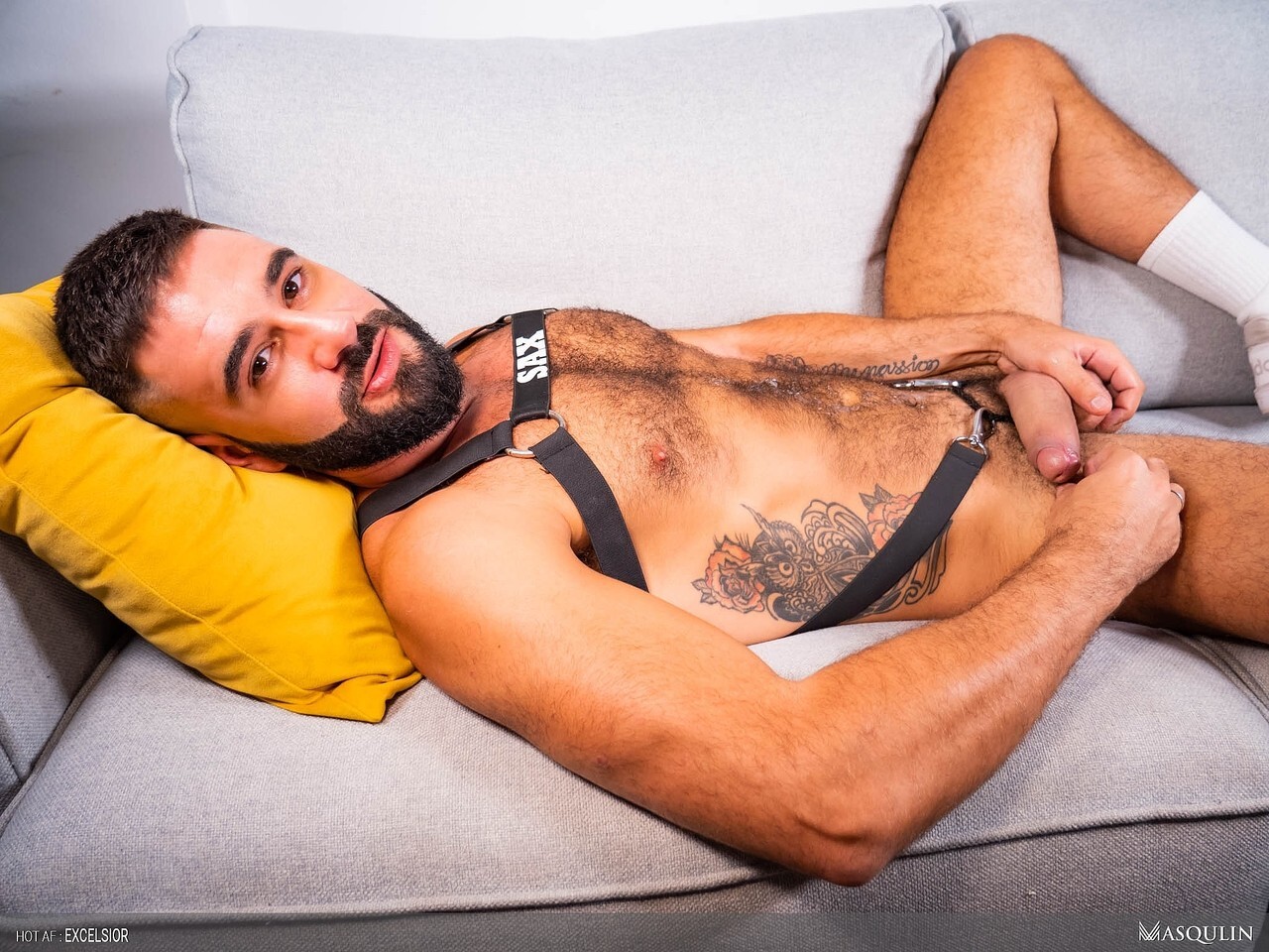 Hot bearded gay King Heart flaunts his hairy body and massive knob