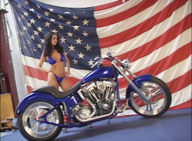 American intercourse doll Crissy Moran poses on a traditional bike