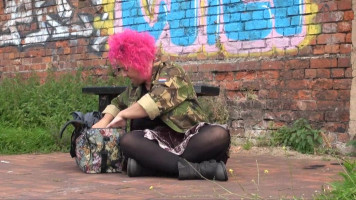 Sexy crimson-haired UK mature sucks a dildo in public location