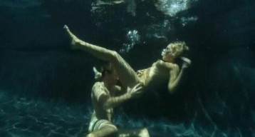 Underwater intercourse with a lengthy-legged mademoiselle