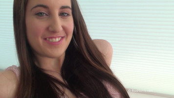 Astonishing brunette with angelic smile is going topless