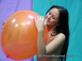 Black-haired cutie with herbal jugs likes balloon fetish