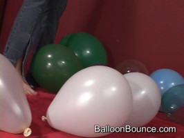 Busty brunette in tight black denims and her cute balloons