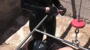 Redhead intercourse slave is getting humiliated with the aid of using Domina in black latex