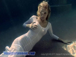 Angelic huge-boobed babe in white get dressed poses Underwater