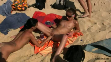 Awesome younger babes are banging at the seashore with out limits