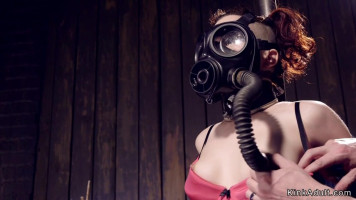 Redhead with gas mask tormented