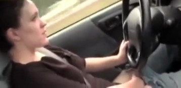 She Fingers Her Pussy While Driving