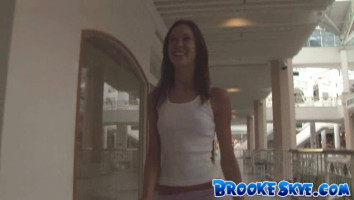 Miniskirt of younger babe Brooke Skye slightly covers her best ass