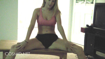 Flexible and slim Cosmid babe is performing some yoga exercises