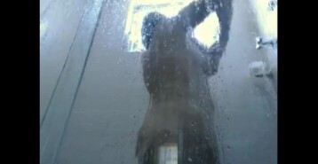 Soapy chick masturbating