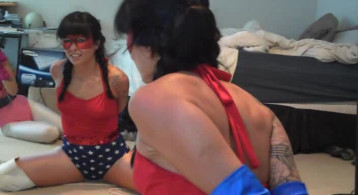 Tattooed dark-haired female in attractive Spandex panties!