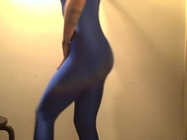 Awesome lengthy-legged mademoiselle poses in blue spandex