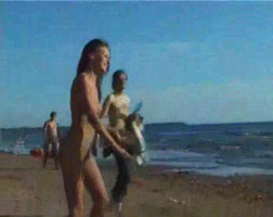 Sexy sling lady friend is slowly getting bare on the general public beach