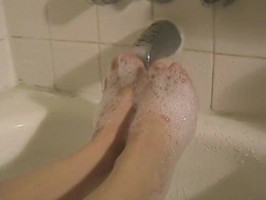 Sweet beginner foot fetish with a leggy cutie and her soapy soles