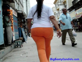 Spotted an interesting large booty female in tight orange pants