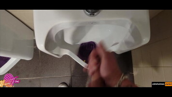 johnholmesjunior does a short jerk off in open urinal film theater bathroom