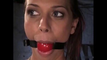 Bound, gagged and drooling cunt Rachel Starr receives spanked and spinned around