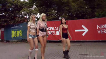 Two captured sluts on a leash have a stroll in Euro streets