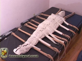 Mummification of a slave and general restraint with belts