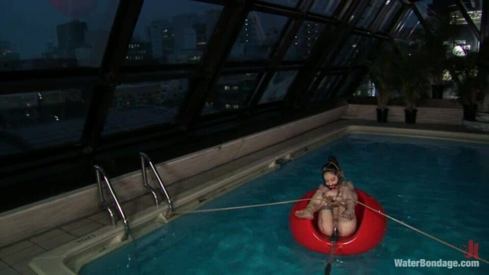 Trapped and tied on a plastic boat in the pool