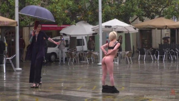 No umbrella for a bare slave in a public square, suffer, whinge