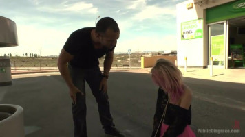 Pink princess on a leash sucks a dick in public on a fueloline station